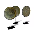 Three Circular Vintage Bronze Plates Decorative Ornament Set on Black Stands