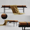 Brown Fabric Sofa Bench With Black Metal Frame And Yellow Throw Blanket