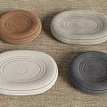 Household Cushions In Various Colors With Round And Oval Shapes On Linen Textured Background