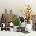 Assorted Spice Bottles with Wooden Cutting Boards Fresh Herbs Kitchen Utensils and Decorative Branches