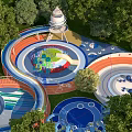 Colorful Outdoor Kids Playground With Slides Circular Areas Tower Structure And Green Trees