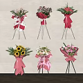 Colorful Flower Bouquets With Pink Wrapping Bowknots Sunflowers Roses And Black Tripods