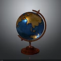 Decorative Desktop Globe With Red Stand Blue Oceans And Golden Continents On Gray Background