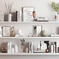 Decorative Ornament Combination On White Shelves With Books Vases Green Plants And Sculptures