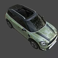 Stylish Green Mini SUV With Black Stripes Black Roof And Alloy Wheels Design