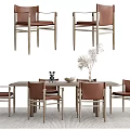 Modern Leather Dining Table Set With Metal Legs And Tabletop Decorative Items