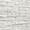 White Natural Stacked Stone Wall Design With Textured Surface For Modern Interior Spaces