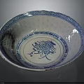 Intricate Carved Ceramic Bowl With Blue And White Floral Patterns Design