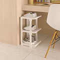 White Three Tiered Corner Shoe Rack With Shoes Near Wooden Wall