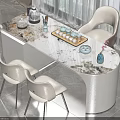 Elegant Modern Tea Table and Chairs with Marble Top White Seats and Tea Set Arrangement