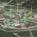 Aerial View Of Industrial Drilling Site With Circular Layout Towers Vehicles Buildings And Roads