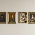 Four Gold Framed Oil Paintings Hanging On Light Colored Wall