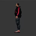 Man in casual outfit black jacket with pink accents black sweatpants and colorful sneakers