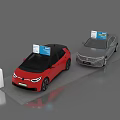 Interactive Zone With Red And Gray Cars Display Boards And Signage