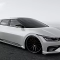 White Modern Sports Car With Sleek Exterior Design And Black Wheels On Road