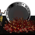 Giant Cone Structure Featuring Latinum Days Text With Scattered Red Orange Flowers And Small Figure