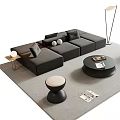Modern Black L Shaped Sofa And Round Coffee Table With Brown Armchair Light Gray Rug