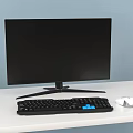 Black Computer Monitor With Black Keyboard Blue Accent Keys And White Mouse On White Desk
