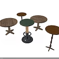 Assorted Round Wooden Side Tables With Different Base Designs And Colors