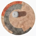 Round Plush Carpet With Abstract Geometric Patterns In Orange Gray And Beige Tones