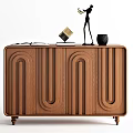 Modern Wooden Sideboard with Grooved Pattern Design and Decorative Figurine and Box on Top