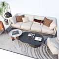 Modern Beige Sofa and Coffee Table Set with Textured Pillows Patterned Rug Accent Chair and Floor Plant