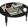 Black Round Coffee Table Featuring Books Candles Pinecones Tray And Cups 3d model