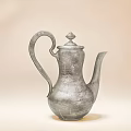 Elegant Silver Teapot With Curved Handle And Lid On Light Background
