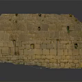 Wooden Stone Wall Structure Featuring Yellow Textured Blocks And Small Decorative Holes