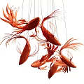 Red Fish Shaped Chandelier with Artistic Design Hanging in Modern Interior
