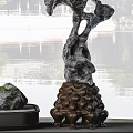 Ornamental Decorative Set Featuring Artistic Rock Stone Base With Chinese Style Architecture And Water Reflection