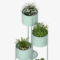 Modern Garden Decor With Golden Multi Tiered Plant Stands White Flowers And Green Foliage