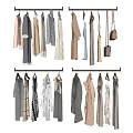 Variety of Fashionable Clothes Hanging on Metal Hangers with Various Styles and Colors
