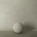 Minimalist Textured Wall with Handmade Rough Scratches and White Sphere on Smooth Tabletop