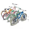 Colorful Bicycles In Orange Red Green Blue Hues Parked Together