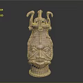 Ancient Bronze Head Sculpture With Intricate Facial Details And Avian Motifs