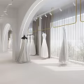 Elegant Bridal Shop Interior With White Walls Arched Doorways And Light Stone Floor