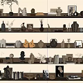 Artistic Decorative Ornament Combinations On Multiple Shelves With Vases Sculptures Books And Decor Items