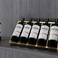 Elegant Golden Wine Cabinet Interior With Grey Wooden Background And Whisky Bottles