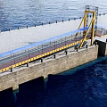 Industrial Bridge Featuring Yellow Metal Structure Blue Canopy And Stone Wall Over River