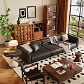 Black Leather Sofa Coffee Table Set With Pillows Books Vase Throw Blanket And Green Plant