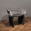 Modern Gray Fabric Leisure Chair With Unique Curved Frame On Wooden Floor