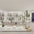 Modern Clothing Store Interior With Hanging Clothes Racks Decorative Plants And Display Areas