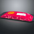 Packaged Fresh Raw Red Meat In Black Tray With Red Yellow Label Text