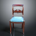 Elegant Classic Wooden Chair With Intricate Carved Backrest And Blue Upholstered Seat