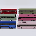 Six Colorful Model Buses in Various Hues Neatly Arranged on White Background