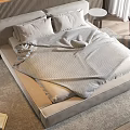 Modern Double Bed with Gray Bedspread Pillows Bedside Tables Chair Rug and Wooden Floor