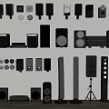 Various Types of Headphones and Audio Speakers Neatly Arranged on Wall and Floor