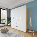 White Wardrobe With Three Doors Two Drawers And Black Handles On Wooden Floor