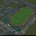 Top View Football Field with Green Grass Red Running Track Blue Stands and Surrounding Buildings